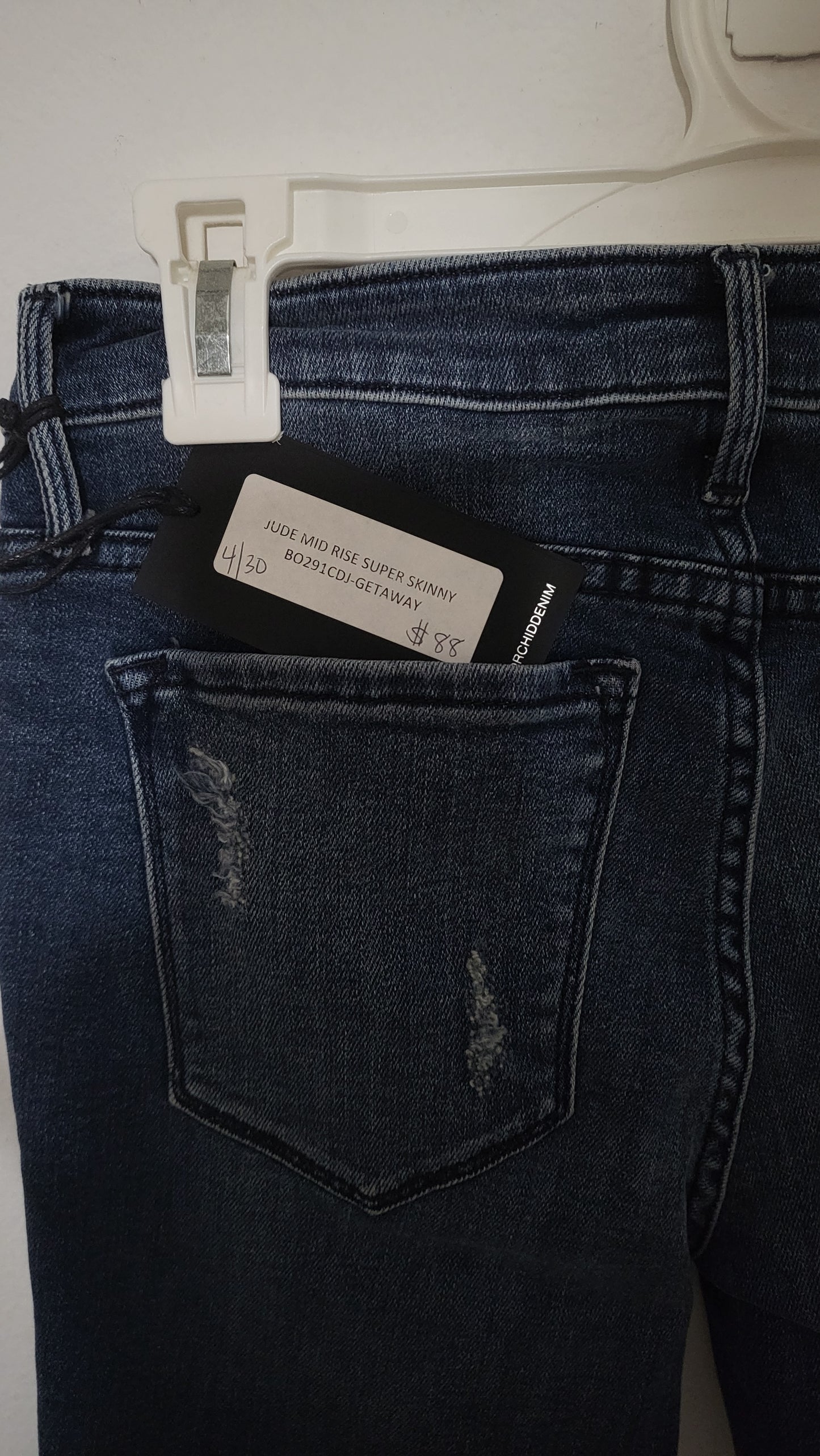 Close-up of Black Orchid Jude Mid Rise Super Skinny jeans stitching and fabric texture from ShAesthetics