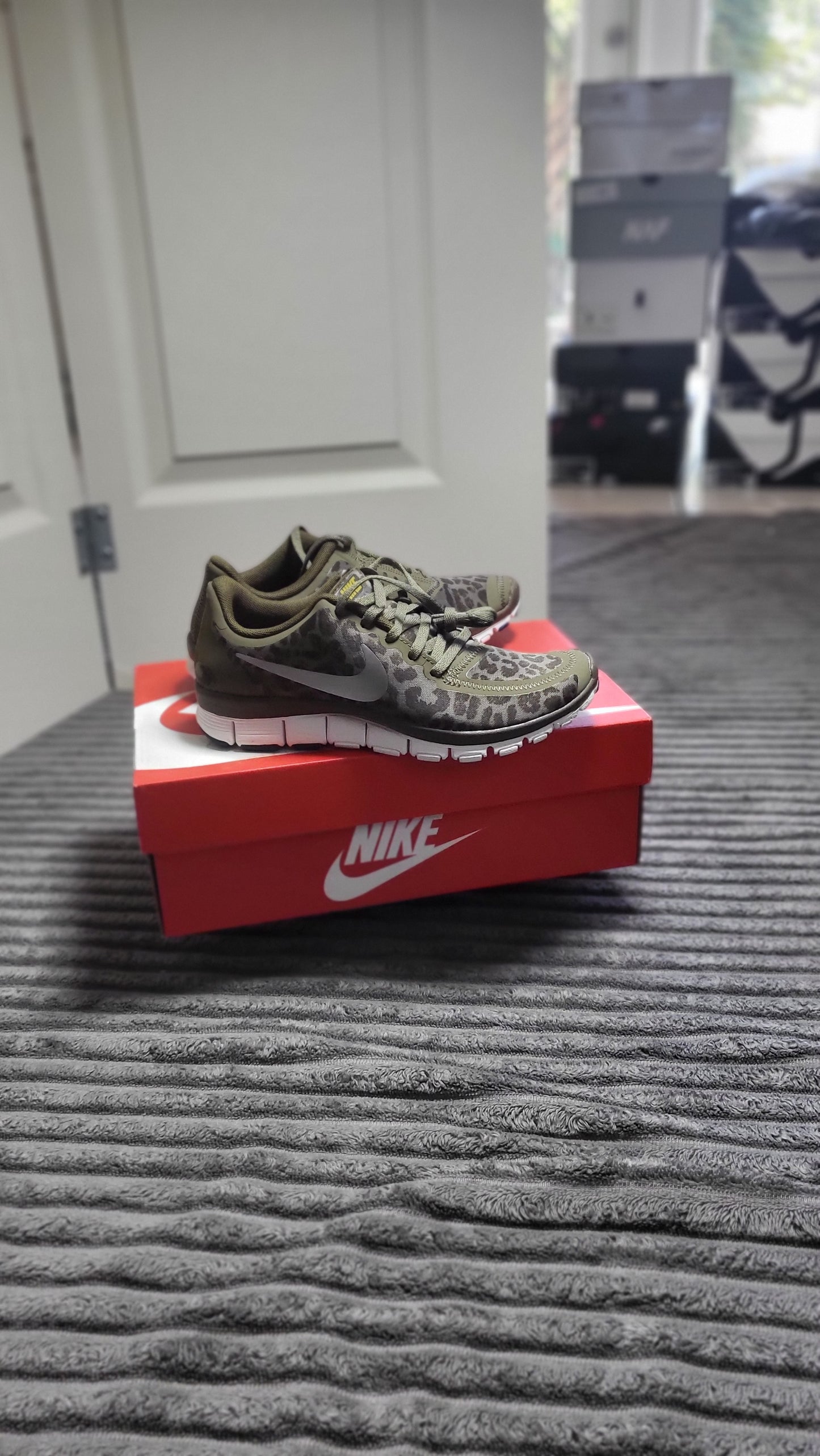 Eye-catching Nike Free 5.0 V4 “Olive Leopard Camo” shoes size 5, designed for gym workouts and street style, certified for comfort and durability at ShAesthetics
