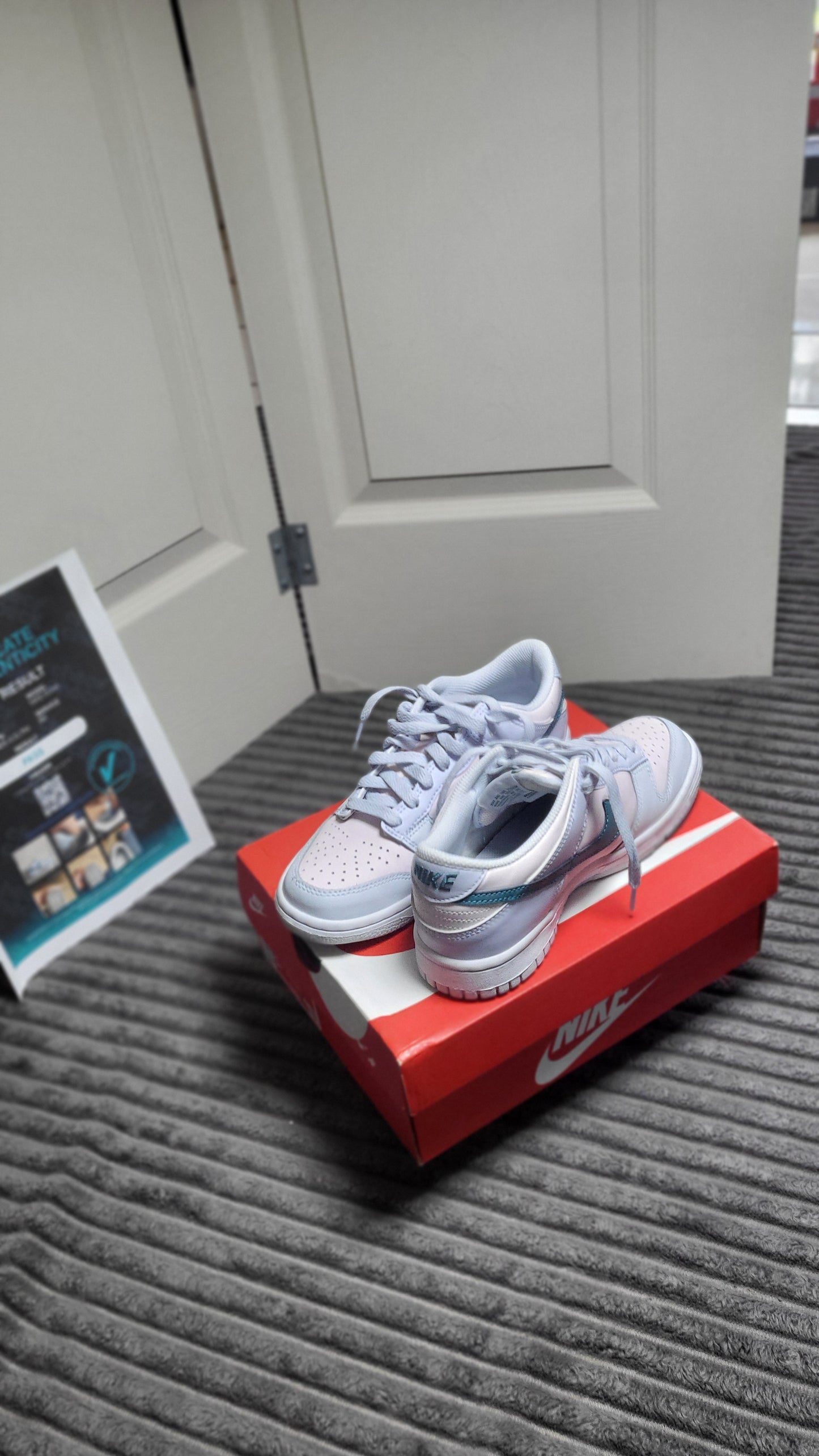 Shop Nike Dunk Low (GS) “Pink Foam / Teal Nebula” sneakers size 5Y, featuring soft pastel colors and bold design, ideal for youth fashion at ShAesthetics