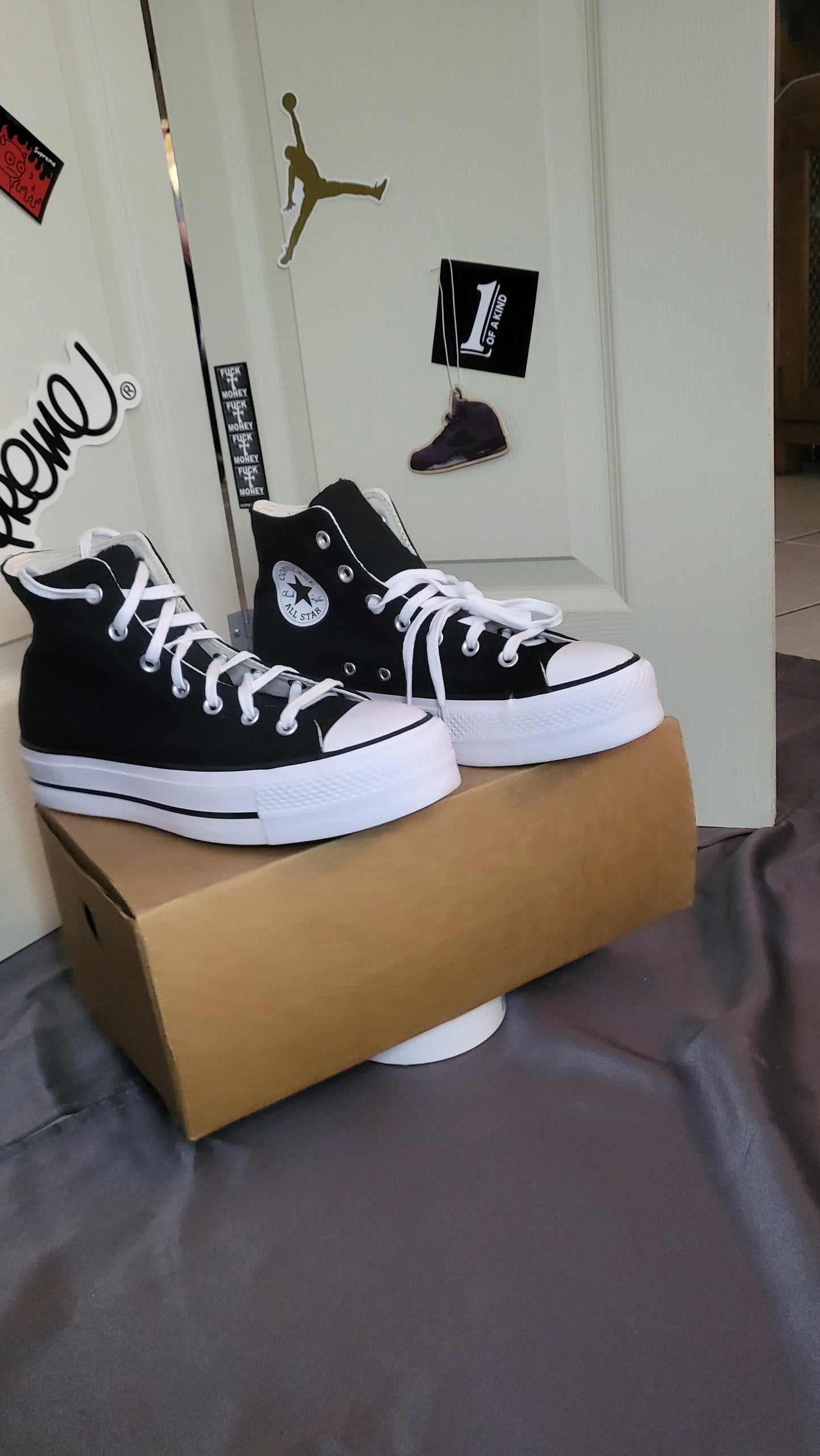 Brand new black canvas Converse Chuck Taylor All Star High Top sneakers in women’s US size 8.5 with white rubber sole and classic star patch logo