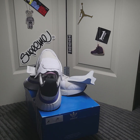 Adidas Micropacer x NMD R1 “Triple White” sneakers size 10.5, featuring clean all-white design and retro tech style reinvented, available at ShAesthetics