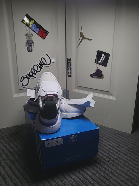 Adidas Micropacer x NMD R1 “Triple White” sneakers size 10.5, featuring clean all-white design and retro tech style reinvented, available at ShAesthetics