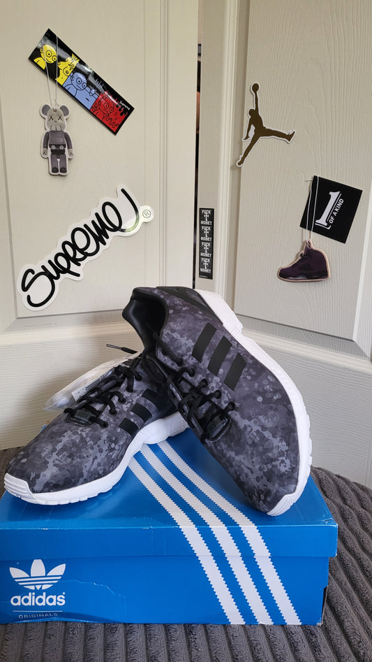Adidas ZX Flux White Mountaineering sneakers in digital camo black with original blue Adidas box