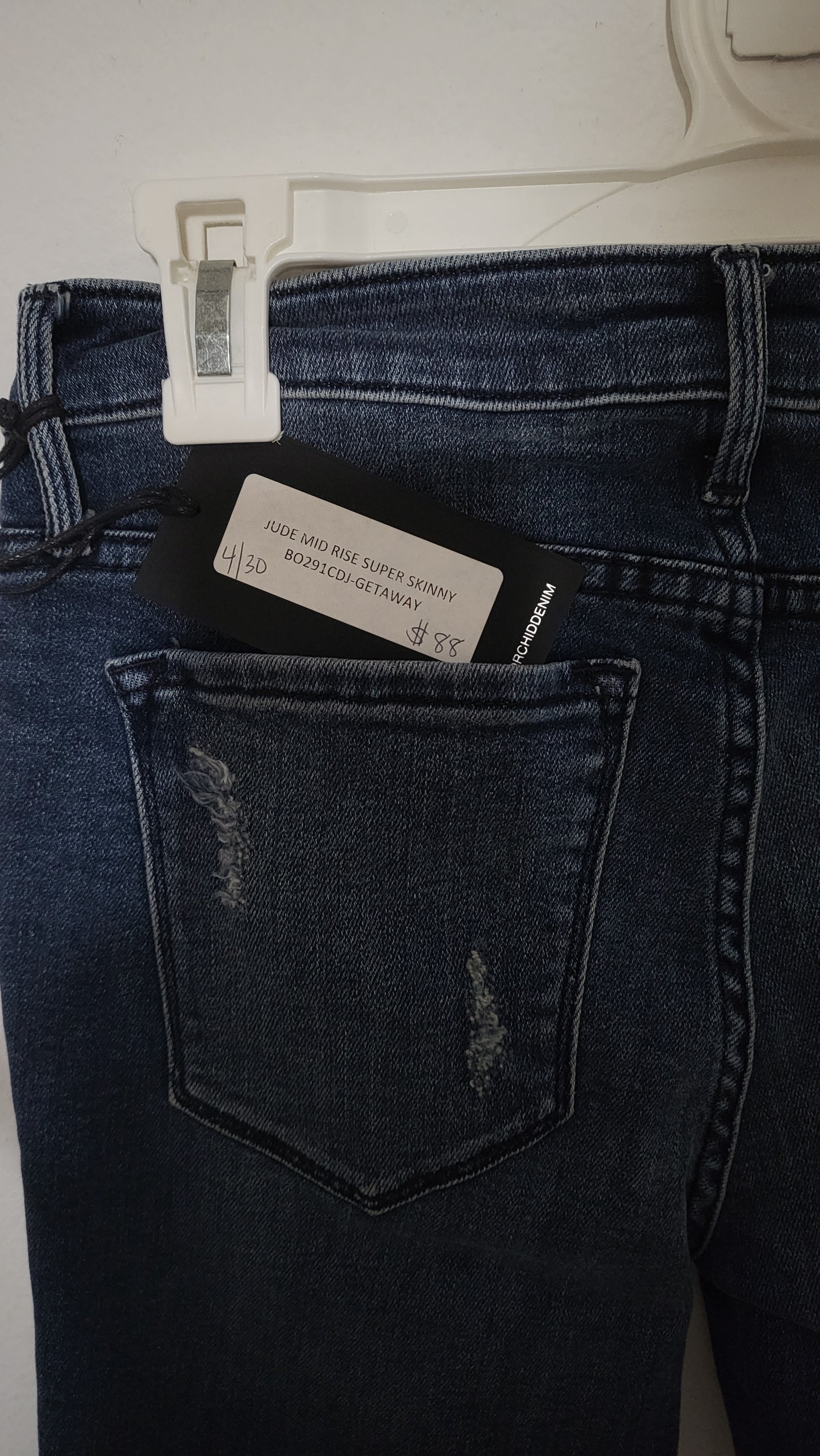 Close-up of Black Orchid Jude Mid Rise Super Skinny jeans stitching and fabric texture from ShAesthetics