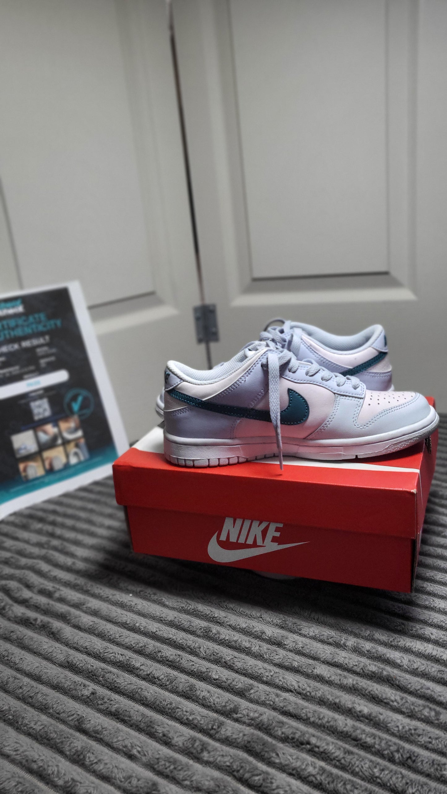 Vibrant Nike Dunk Low (GS) “Pink Foam / Teal Nebula” size 5Y sneakers, perfect for youth with a mix of soft pastels and strong presence, available at ShAesthetics