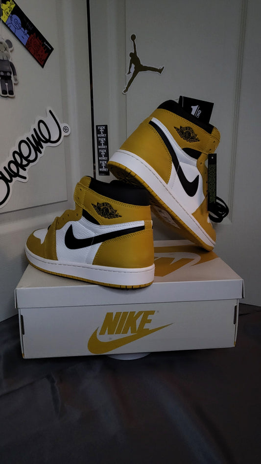 Brand new Air Jordan 1 Retro High OG sneakers in yellow ochre suede with white leather and black swoosh, men’s US size 9.5, with original cream and yellow Nike box