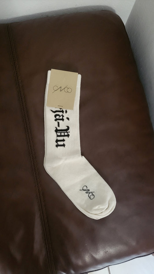 ONCO white crew socks with black gothic lettering and ribbed design