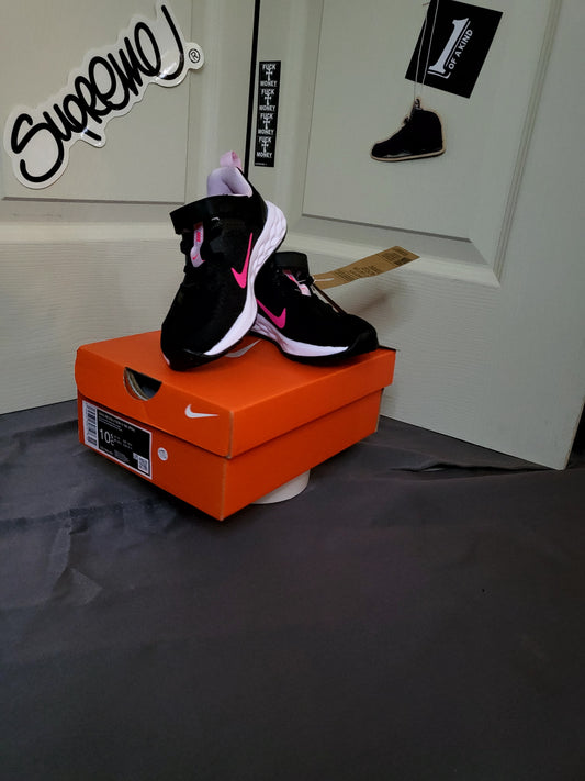 Brand new Nike Revolution 6 NN (PSV) kids running shoes in black mesh with hyper pink swoosh and white foam sole, size 10C preschool, with original box and tags